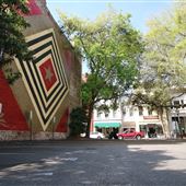 Groucho's Mural - City Parking Lot on King near Calhoun